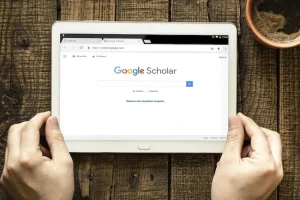 Giao diện trang chủ Google Scholar trên máy tính bảng để tìm kiếm tài liệu khoa học